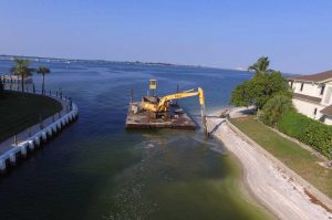 Florida Marine Construction excavating entrance channel to Sanibel Island Marina.