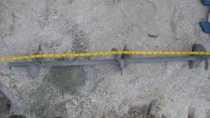 view of helices prior to installation for seawall anchoring